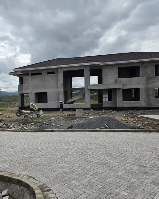 Gray interlocking paver driveway at a new construction home